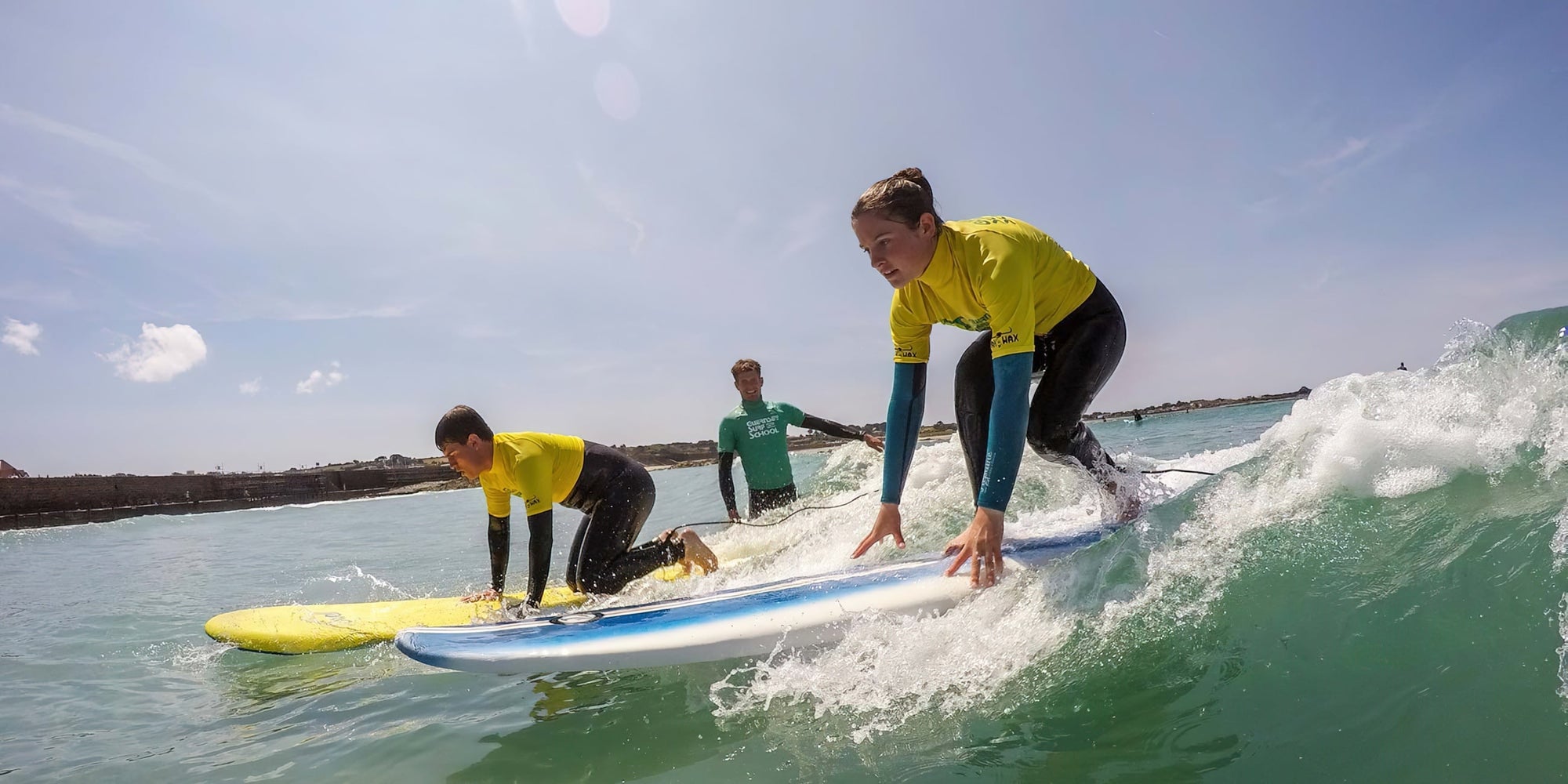 Family surf lessons with the guernsey surf school
