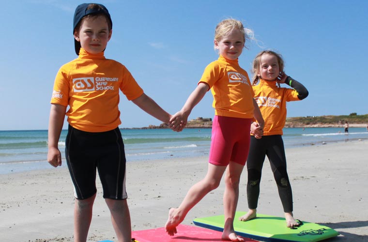 summer fun for young children at vazon bay - Guernsey Surf School