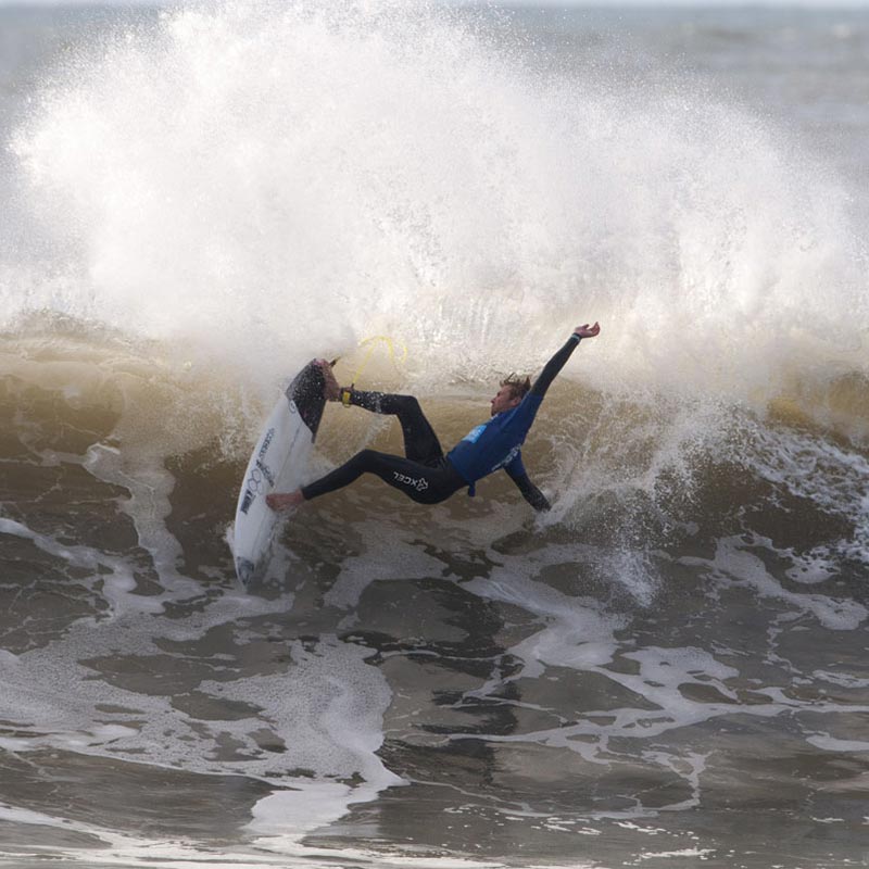Johnny Wallbridge, owner of the Guernsey Surf School on his way to winning the Senior British surf championships at Croyde