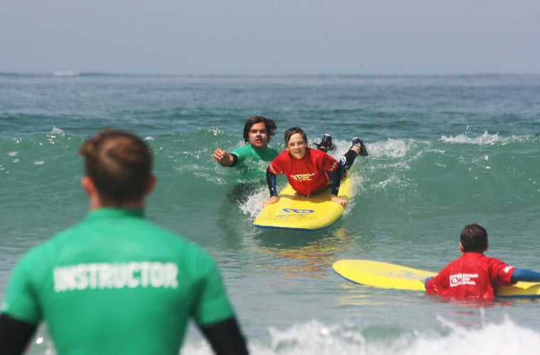 learning to surf with the Guernsey surf school at Vazon bay
