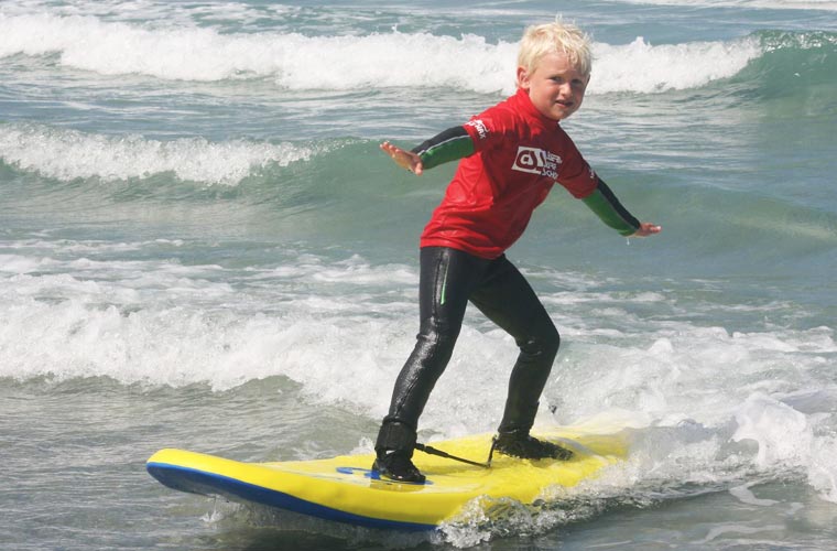 learning to surf with the Guernsey surf school